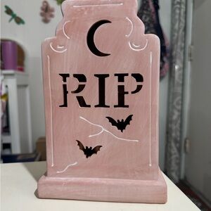 hide and eek terra-cotta tombstone